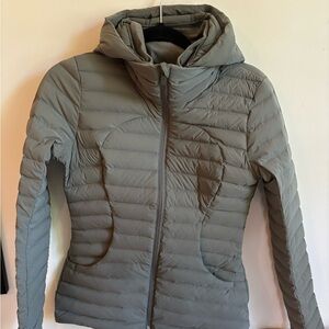 Size 4 lululemon jacket never worn before. willing to negotiate